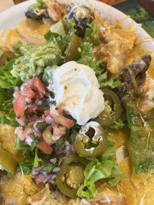 Mixed nachos with chicken and beef fajita meat