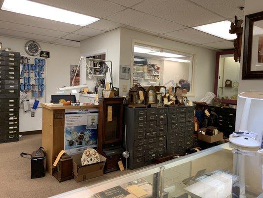 Look when you first walk in. Many many clocks that are brought here to be fixed.