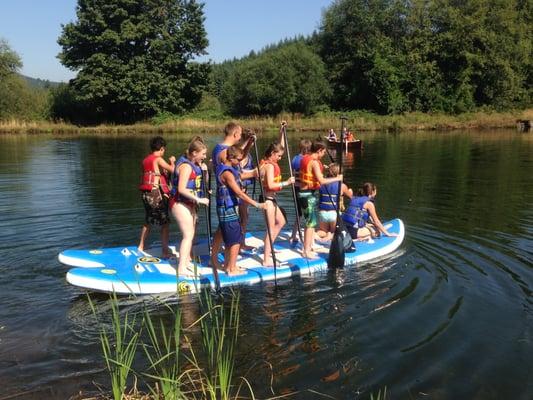 The giant paddle. One of many fun activities at Camp Blue Spruce!