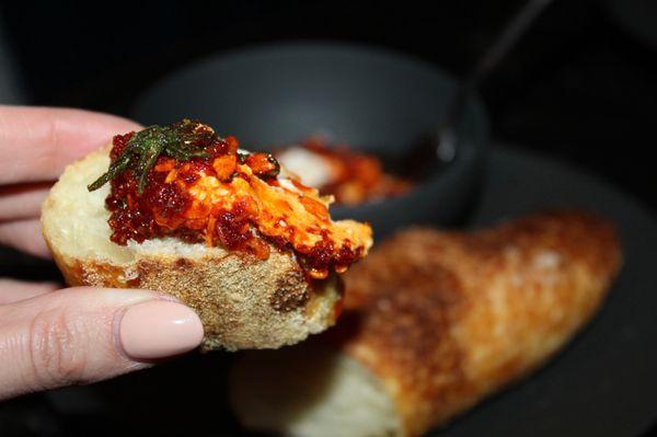 The fluffy riccotta spread easily onto the crunchy baguette. The chili garlic added spice to the milky ricotta.