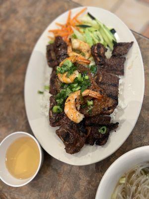 Combination rice dish with shrimp, porkchop and beef ribs