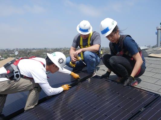 Volunteers up on the roof!