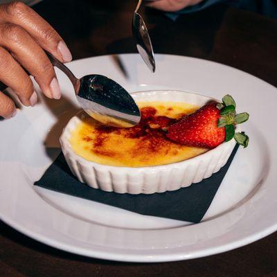 The perfect way to cap off a wild night is with our sweet, housemade Coconut Crème Brûlée.Photo