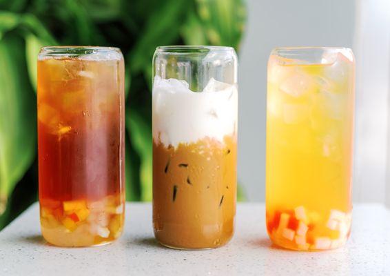 Lychee Black Tea with Crystal Boba and Rainbow Jelly, Vietnamese Iced Coffee and Sea Cream, and Peach Green Tea with Rainbow Jelly