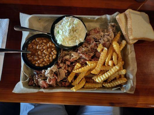 Pulled pork, fries, beans and slaw. Had to be a lb of meat.