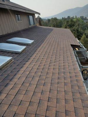 Roof tear-off, new underlayment installation, expert roof replacement los angeles Timberline Hickory shingle roof installation