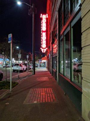 Outside the building is the huge neon sign that says Hong Kong