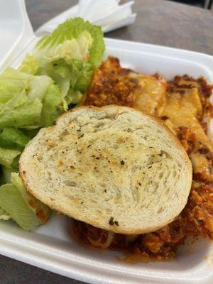 Daily special of lasagna only $8.50, comes with garlic bread and salad.