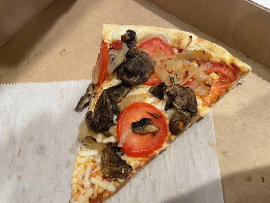 I ate the whole pizza before snapping a pic but it was vegan cheese, tomato, and mushroom!