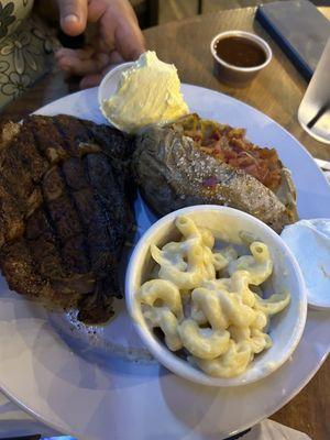 20 oz ribeye, med-well: on point but lacked flavor--4 stars. Loaded potato: sour cream & butter saved it; bacon wasn't fresh--4 stars.