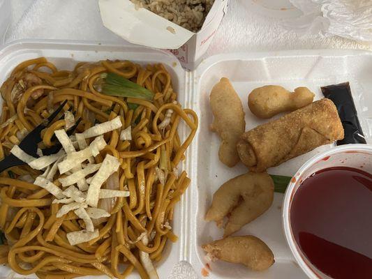 Sweet and sour Chicken with fried rice and shrimp lo mein in take out  boxes