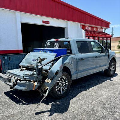 Pre collision repair on 22 Ford F150 damaged bedside