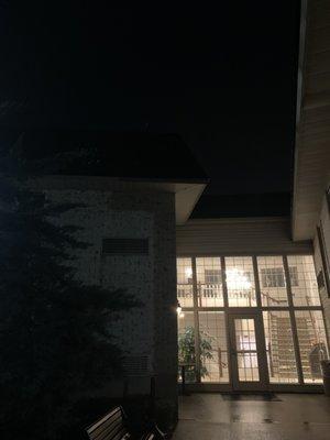 Night windows - from parking lot, middle door to outside