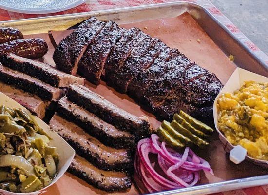 Brisket, ribs, sausage, green beans, and hominy