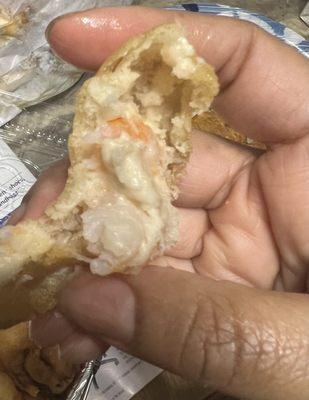 Raw uncooked shrimp batter gooey inside