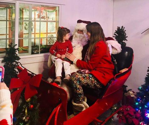 My toddler and I on Santa's Sleigh inside T.W Bonkers!