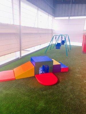 We have created a special space in our all weather playground for infants to play outside safely in their very own age appropriate section!