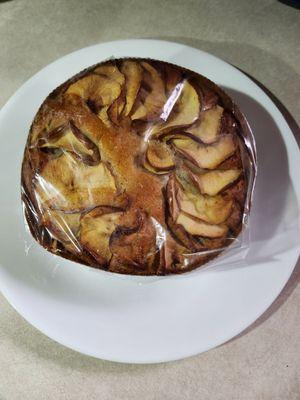 Apple cake on dinner plate.