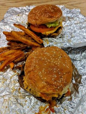 Two little cheeseburgers all the way ($5.99 each) and Cajun fries (not all pictured, $3.39).