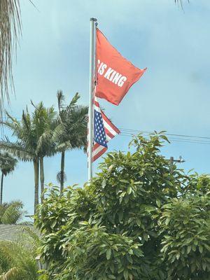 Upside American flag at Dr Caruso's house flying year round.