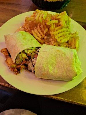 Blackened Chicken Wrap with Waffle Fries.