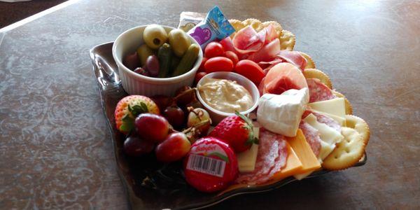 Charcuterie Board: our meat and cheese tray enough for 2 people or enjoyed by one!