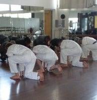 Students getting ready to start class after "belts on"