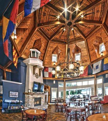 Our fabulous compass point ceiling, lighthouse fireplace and lantern chandelier in the main dining room