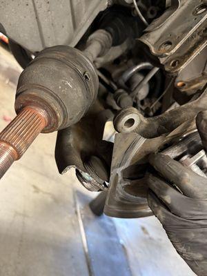 Replacing a lower control arm and wheel hub