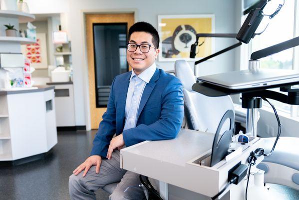 Dr. Matt in a suit at the clinic.