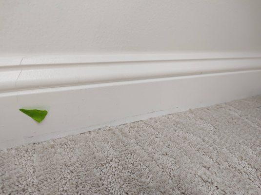 Grease marks on baseboard