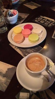 Chef variety of macarons and espresso.