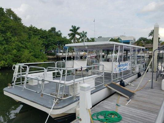 John Pearson pontoon boat for fishing and key trips.  Wheelchair accessible and has a head (bathroom).