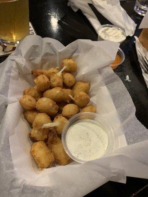 Buffalo Cheese Curds (hot Buffalo sauce is hiding behind the top right side of the basket)