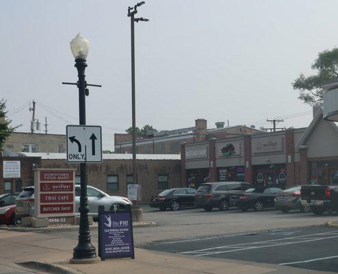 Strip mall signage and storefront.