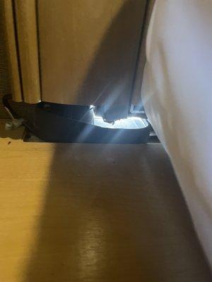 Hole underneath bed where Generator is located