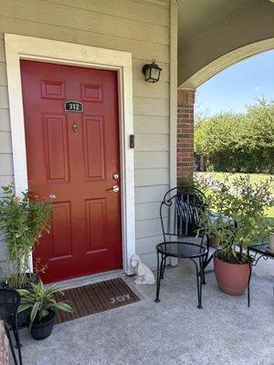 My plants are flourishing & I love the pretty red door!