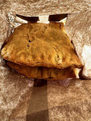 Two beef patties in a bag