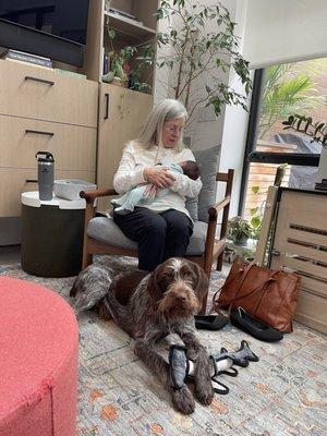 Roxane with our baby and doggie (who adores her!) at her feet.