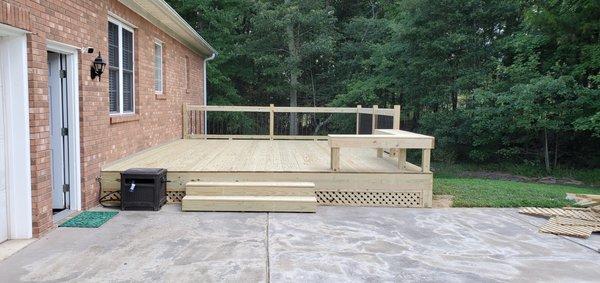 Open front deck with a bench