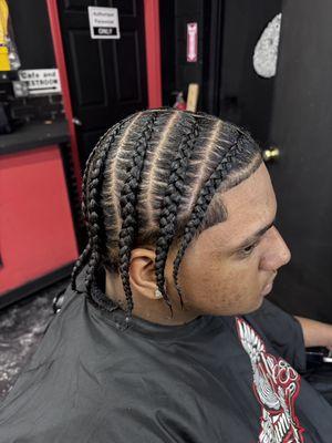 Cornrow style Shampoo and blow dry is included with your braiding service