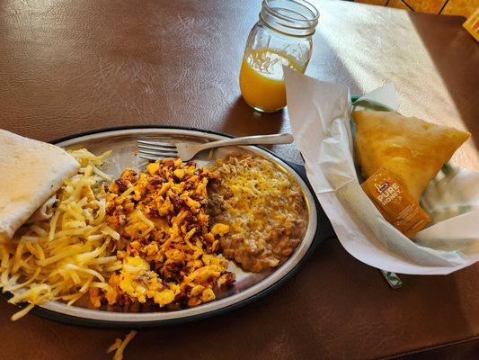 Huevos con chorizo and a sopapilla.