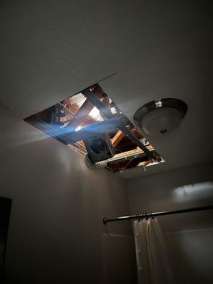 Clearly can see daylight through the hole in the ceiling!