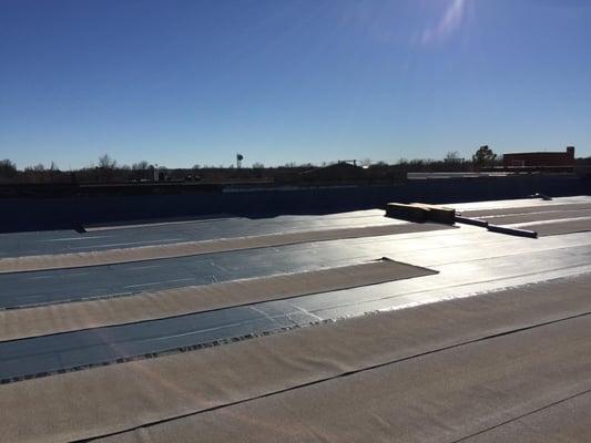 base sheet installed with cap sheet, SA Coolstar rolled out to "relax" in sun on cold winter day in Clinton, Ok.