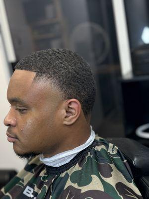 Tuck The Barber at Steelo Cut Club Barbershop