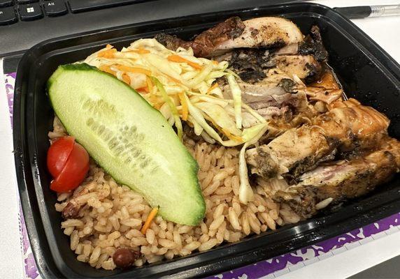 Jerk chicken with rice and peas