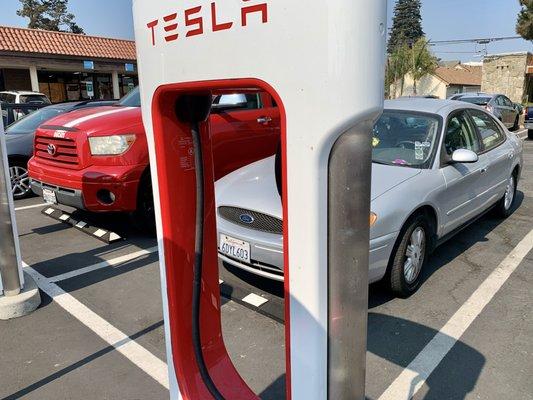 Non electric vehicles are permitted to park in the Tesla Supercharging bays.