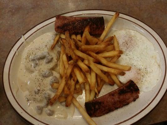 Sausage, biskets with sausage gravy two eggs w/o hash browns and fries substituted in there place.