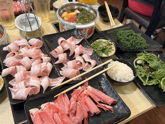 My hubs and I favorite hot pot spot! 2 plates of pork belly 1 plate of premium beef My fav Seaweed noodles and crown daisy