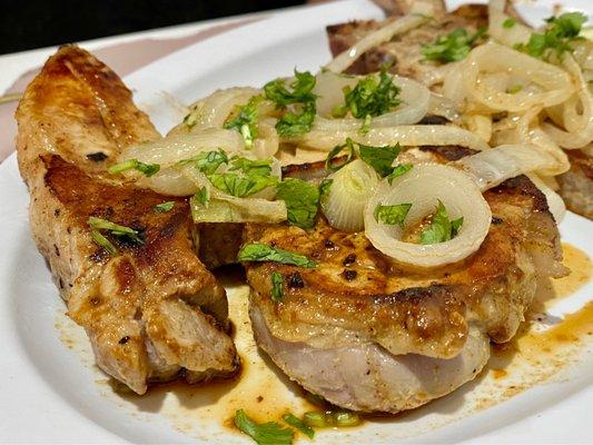 Seasoned to perfection Grilled pork chops yum yum yum! :)...